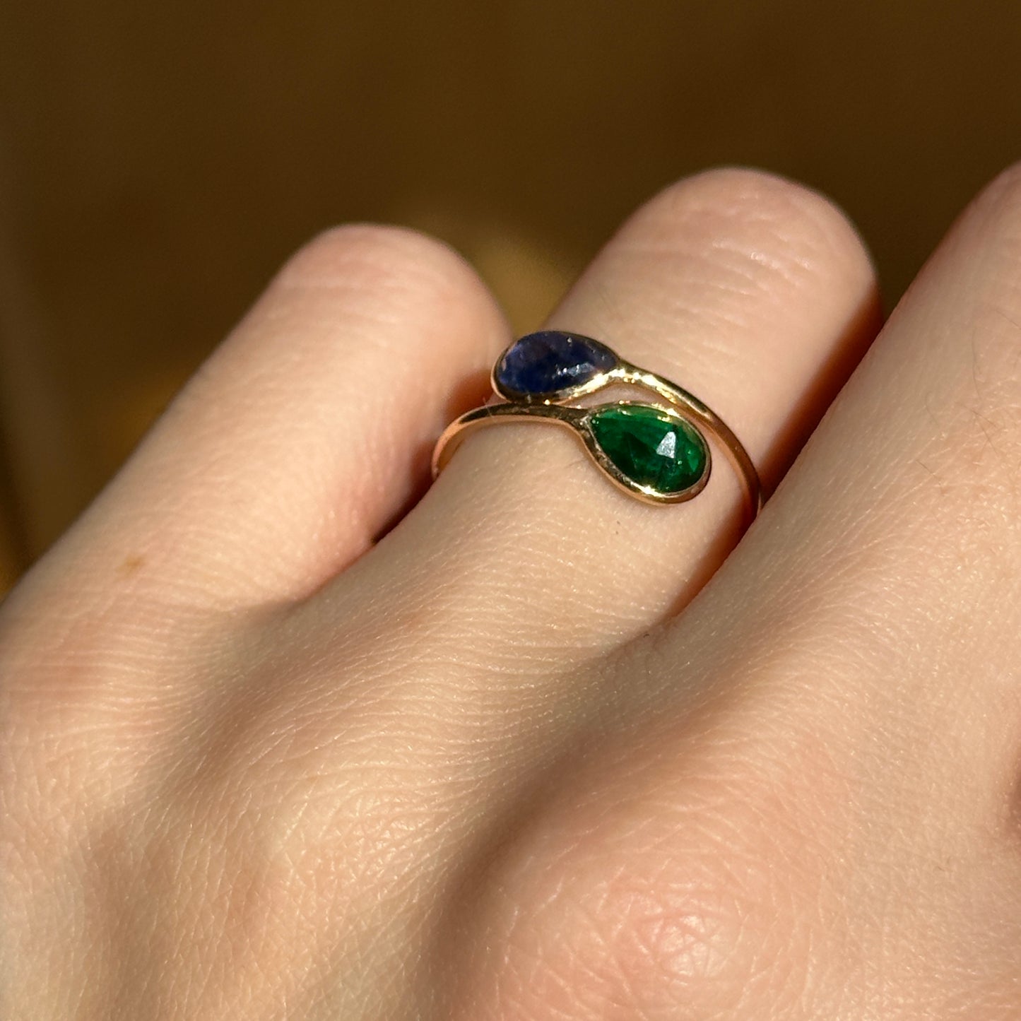 18KT Yellow Gold Pear Emerald + Blue Sapphire Bypass Ring