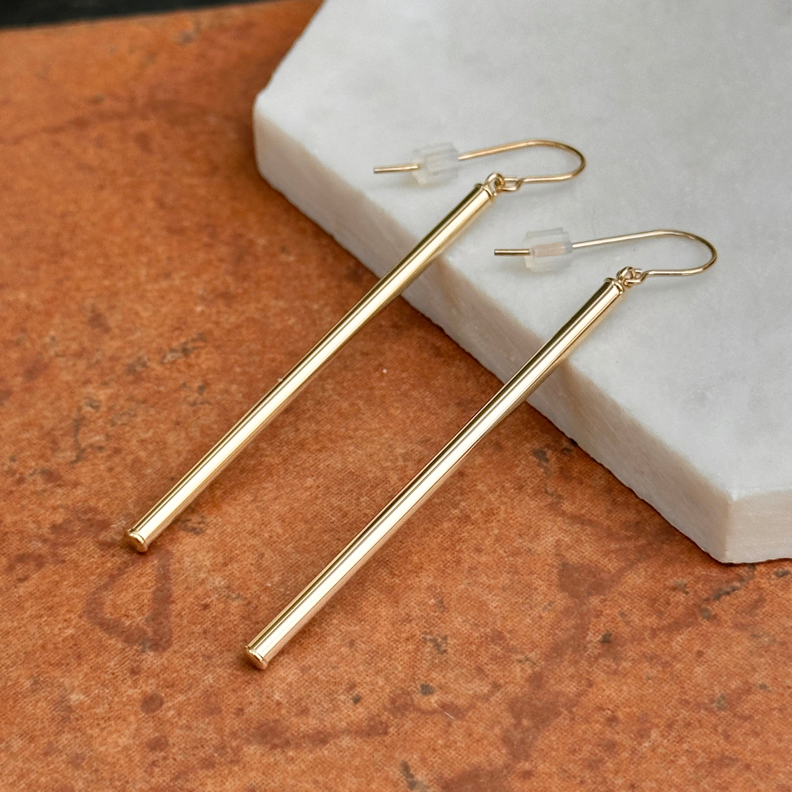 Long gold bar deals dangle earrings