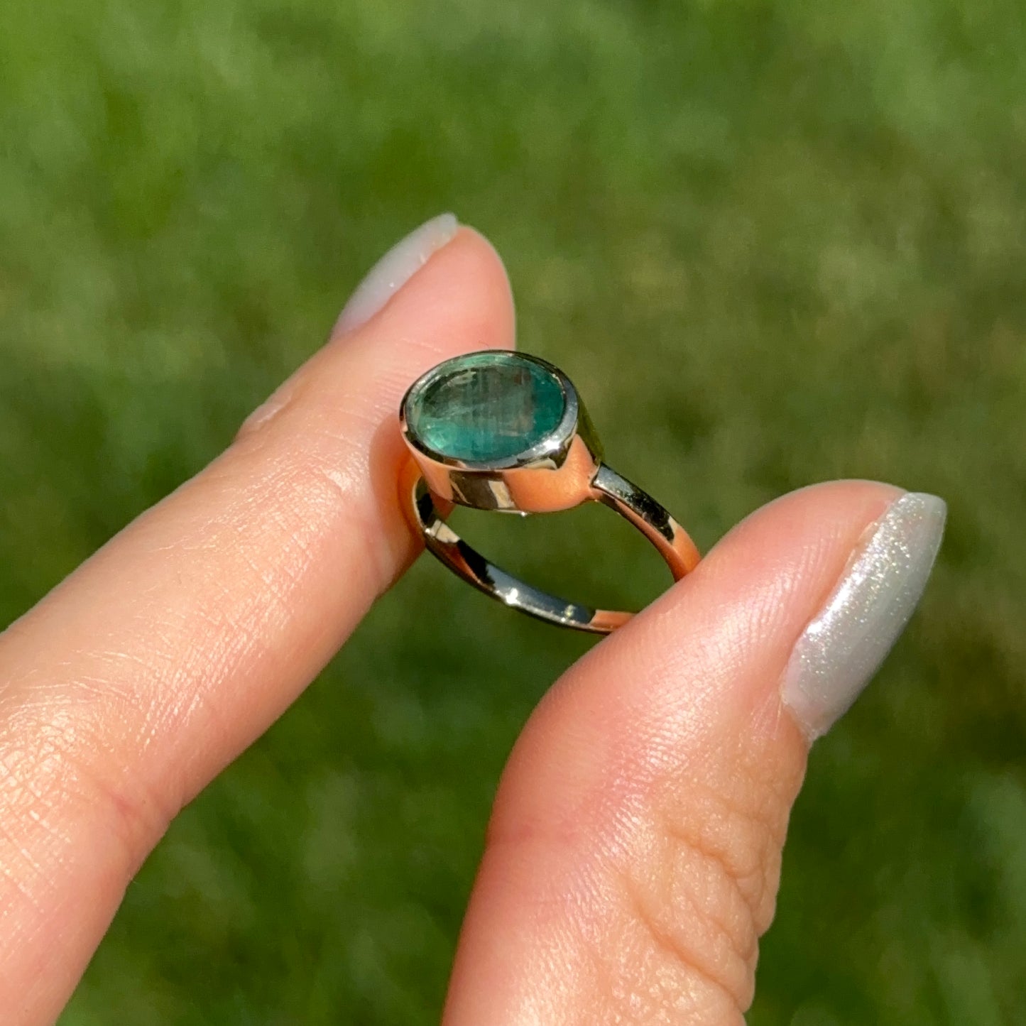 14KT Yellow Gold Oval 2.15 CT Emerald East-West Ring