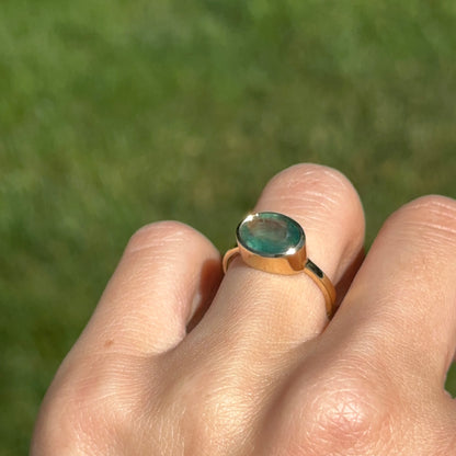 14KT Yellow Gold Oval 2.15 CT Emerald East-West Ring