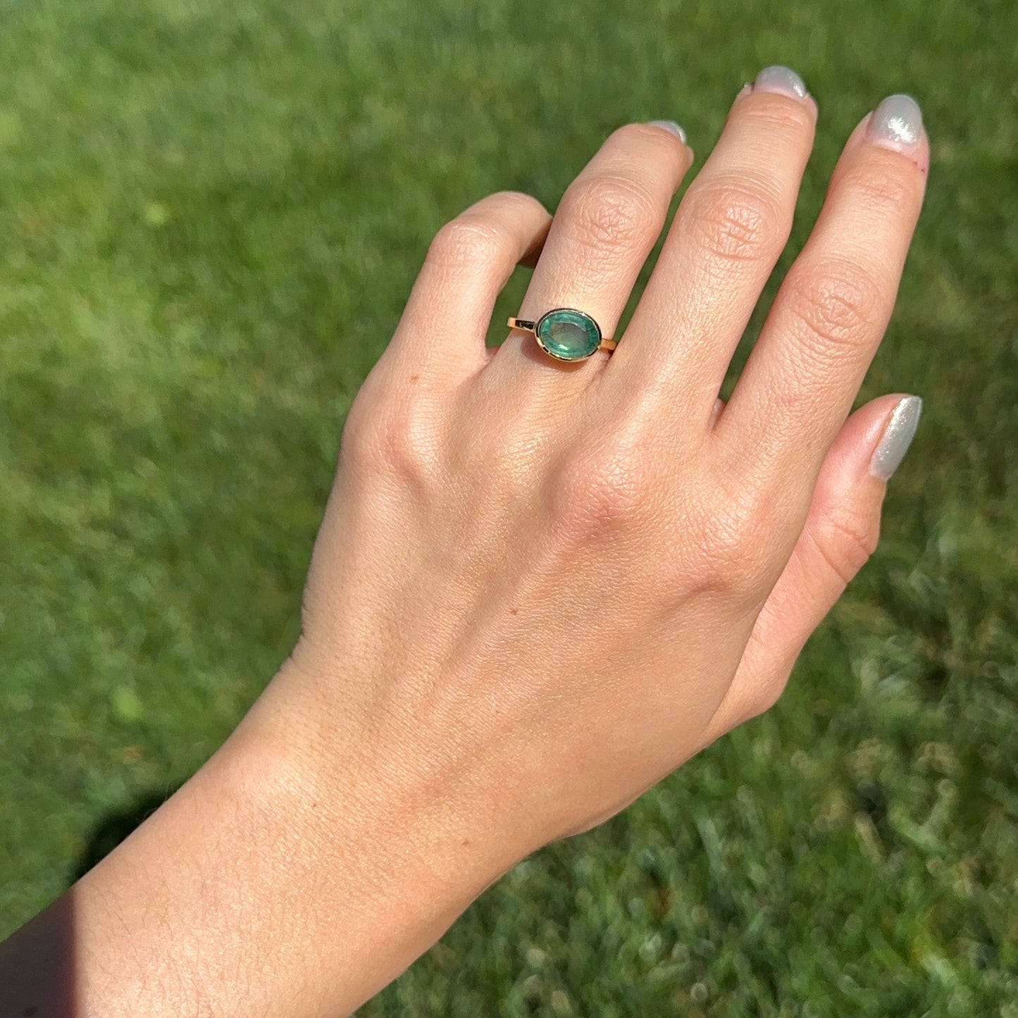 14KT Yellow Gold Oval 2.15 CT Emerald East-West Ring