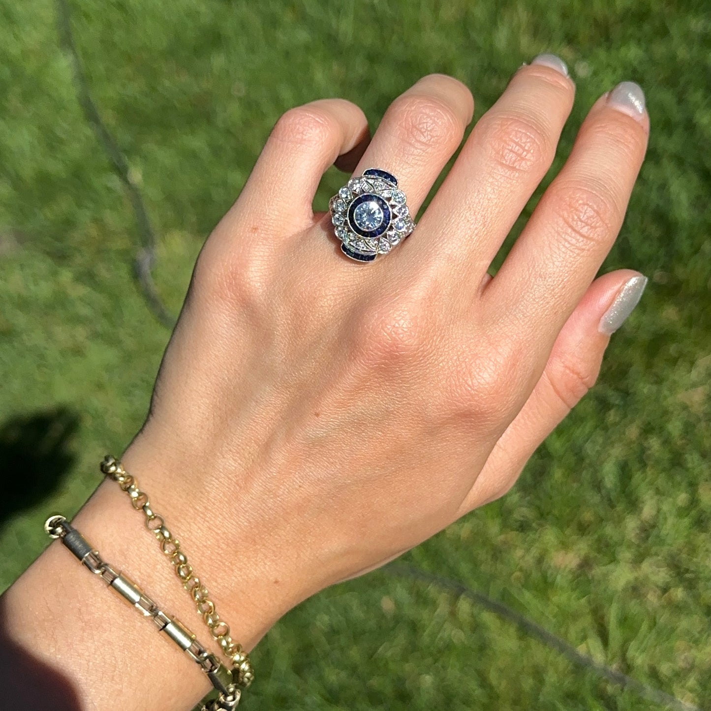 Platinum Art Deco Round Diamond + Blue Sapphire Ring