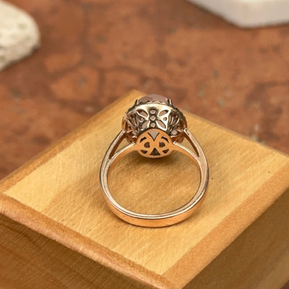 14KT Rose Gold Cabochon Rose Quartz + Diamonds Halo Band Ring