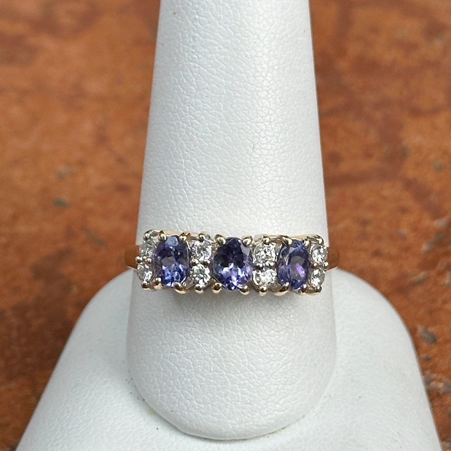 Estate 14KT Yellow Gold Oval Tanzanite + Diamond Band Ring