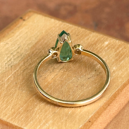 Estate 18KT Yellow Gold Elongated Pear Emerald + Diamond Ring
