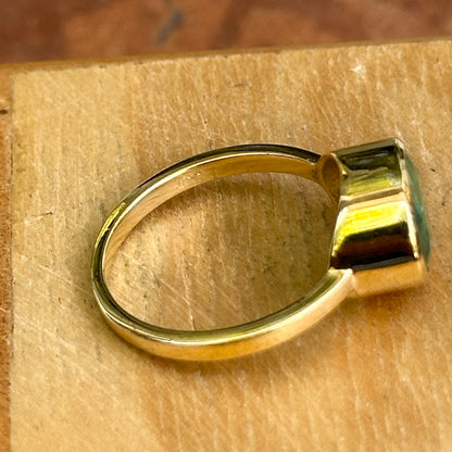 14KT Yellow Gold Oval 2.15 CT Emerald East-West Ring