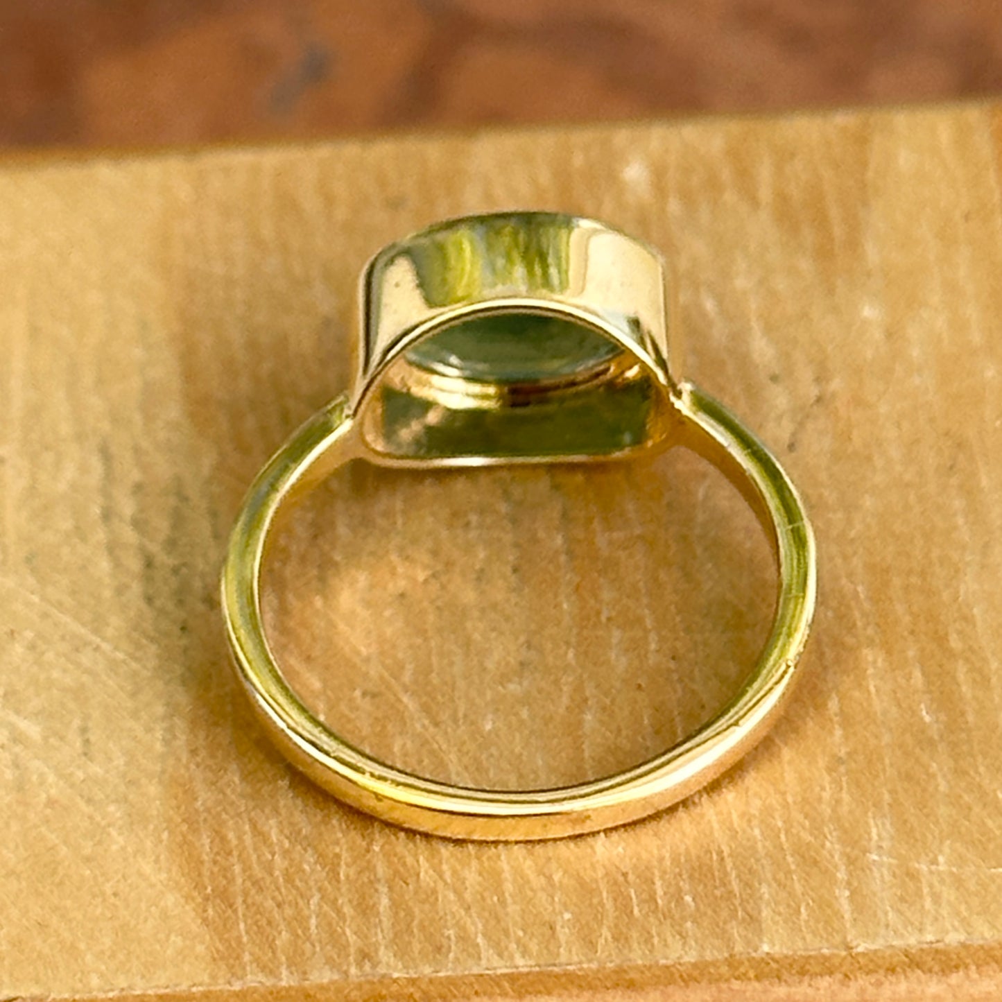 14KT Yellow Gold Oval 2.15 CT Emerald East-West Ring