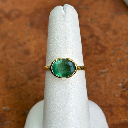 14KT Yellow Gold Oval 2.15 CT Emerald East-West Ring