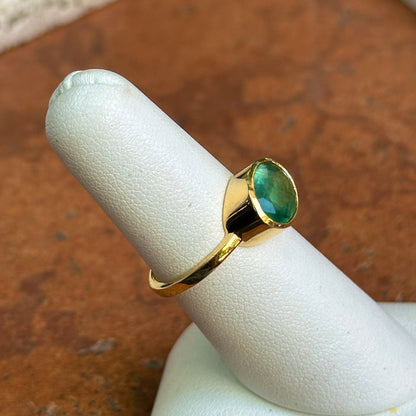 14KT Yellow Gold Oval 2.15 CT Emerald East-West Ring