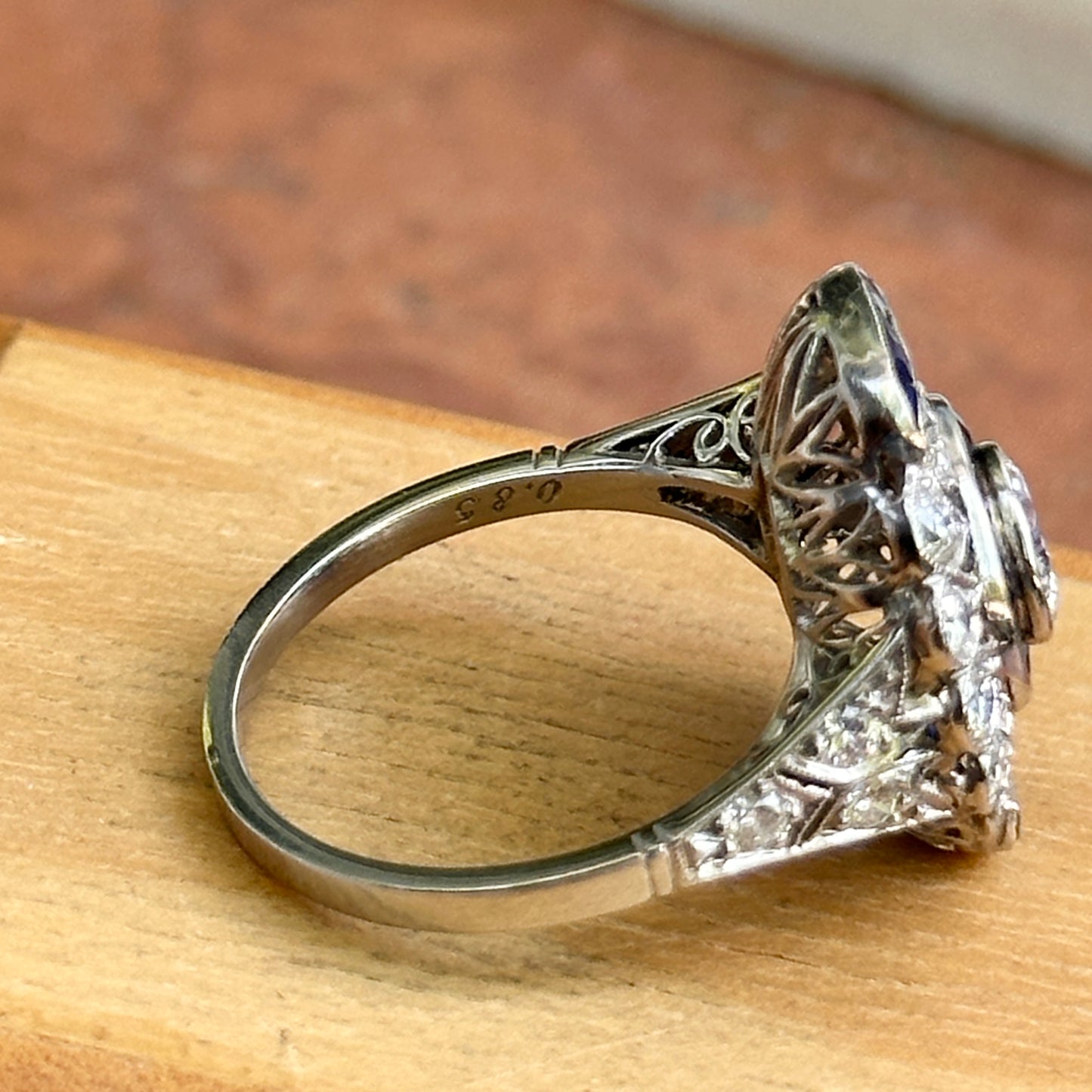 Platinum Art Deco Round Diamond + Blue Sapphire Ring