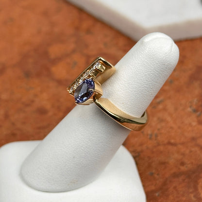 Estate 14KT Yellow Gold Oval Tanzanite and Round Diamond Ring