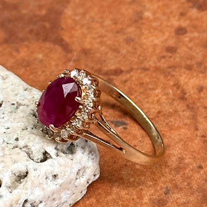 Estate 14KT Yellow Gold Oval 1.2 CT Ruby + Diamond Halo Ring