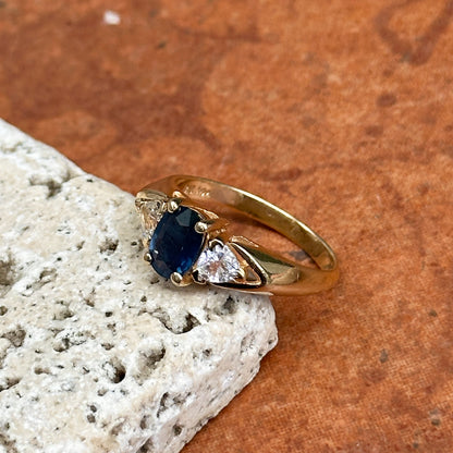 Estate 14KT Yellow Gold Oval 1.10 CT Blue Sapphire + Trillion Diamond Ring