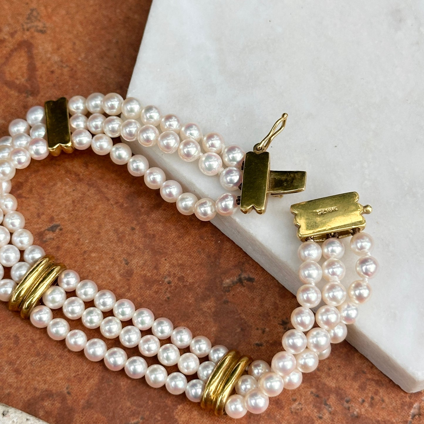 14KT Yellow Gold Three Strand Pearl w/ Gold "X" Links Bracelet