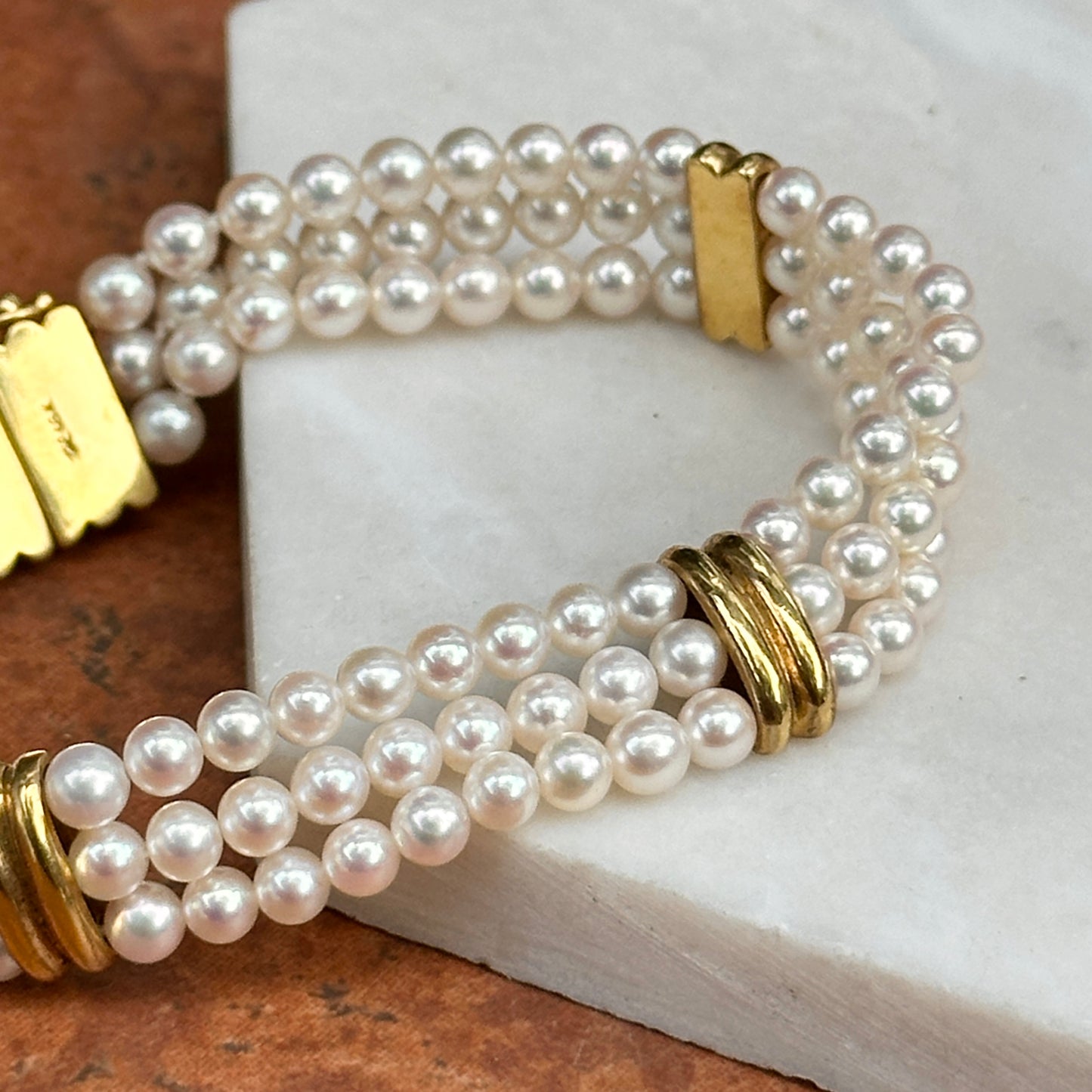 14KT Yellow Gold Three Strand Pearl w/ Gold "X" Links Bracelet