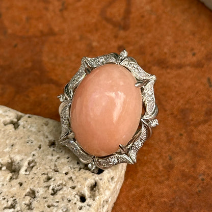 Estate Platinum Peruvian Peach Opal + Diamond Halo Ring