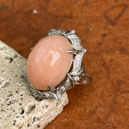 Estate Platinum Peruvian Peach Opal + Diamond Halo Ring
