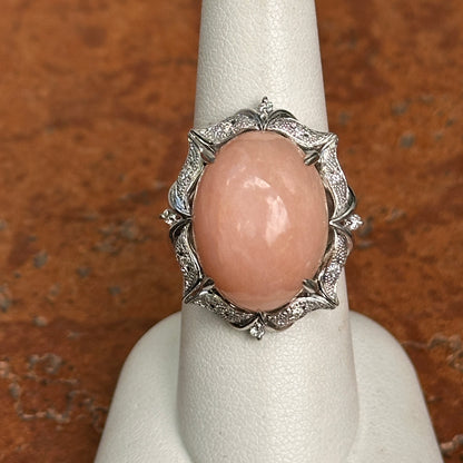 Estate Platinum Peruvian Peach Opal + Diamond Halo Ring