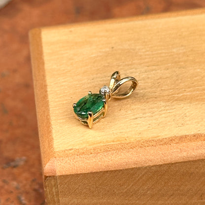Estate 14KT Yellow Gold Oval Faceted Emerald + Diamond Pendant
