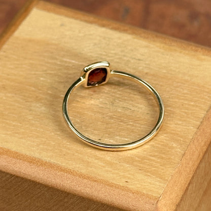 14KT Yellow Gold Bezel Garnet Thin Band Ring