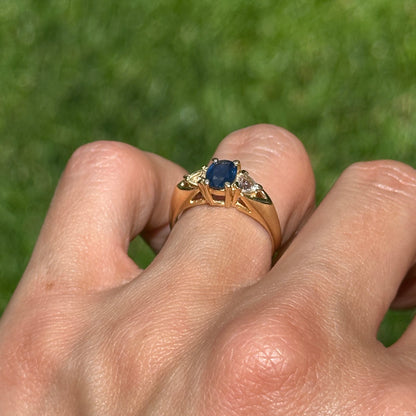 Estate 14KT Yellow Gold Oval 1.10 CT Blue Sapphire + Trillion Diamond Ring
