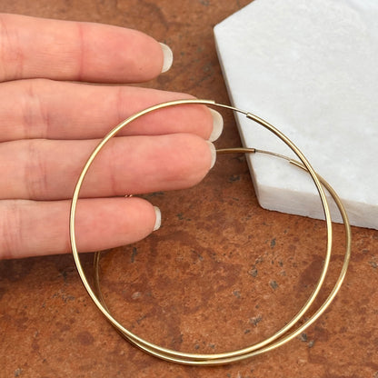 Sold 14KT Yellow Gold 1.25mm Thin Tube Endless Round Hoop Earrings Large - LSJ
