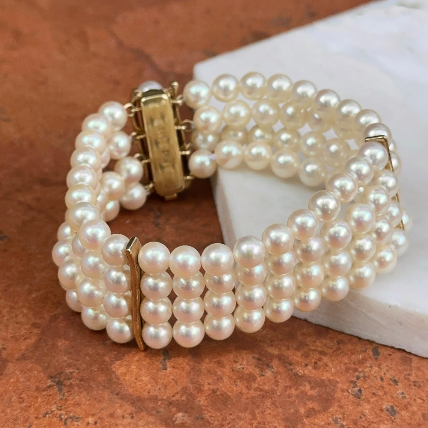 14KT Yellow Gold Four Strand Pearl Bracelet + Yellow Gold Links
