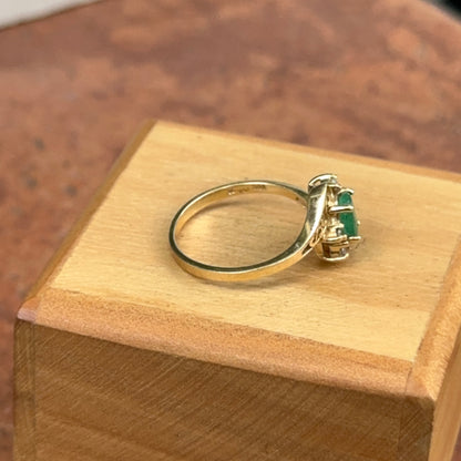 Estate 14KT Yellow Gold Oval Emerald + Round Diamond Ring