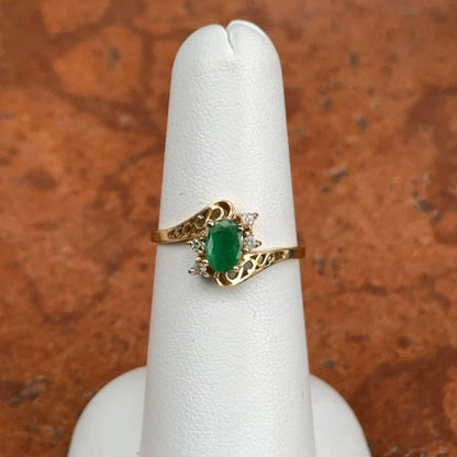 Estate 14KT Yellow Gold Oval Emerald + Round Diamond Ring