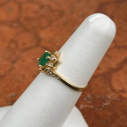 Estate 14KT Yellow Gold Oval Emerald + Round Diamond Ring