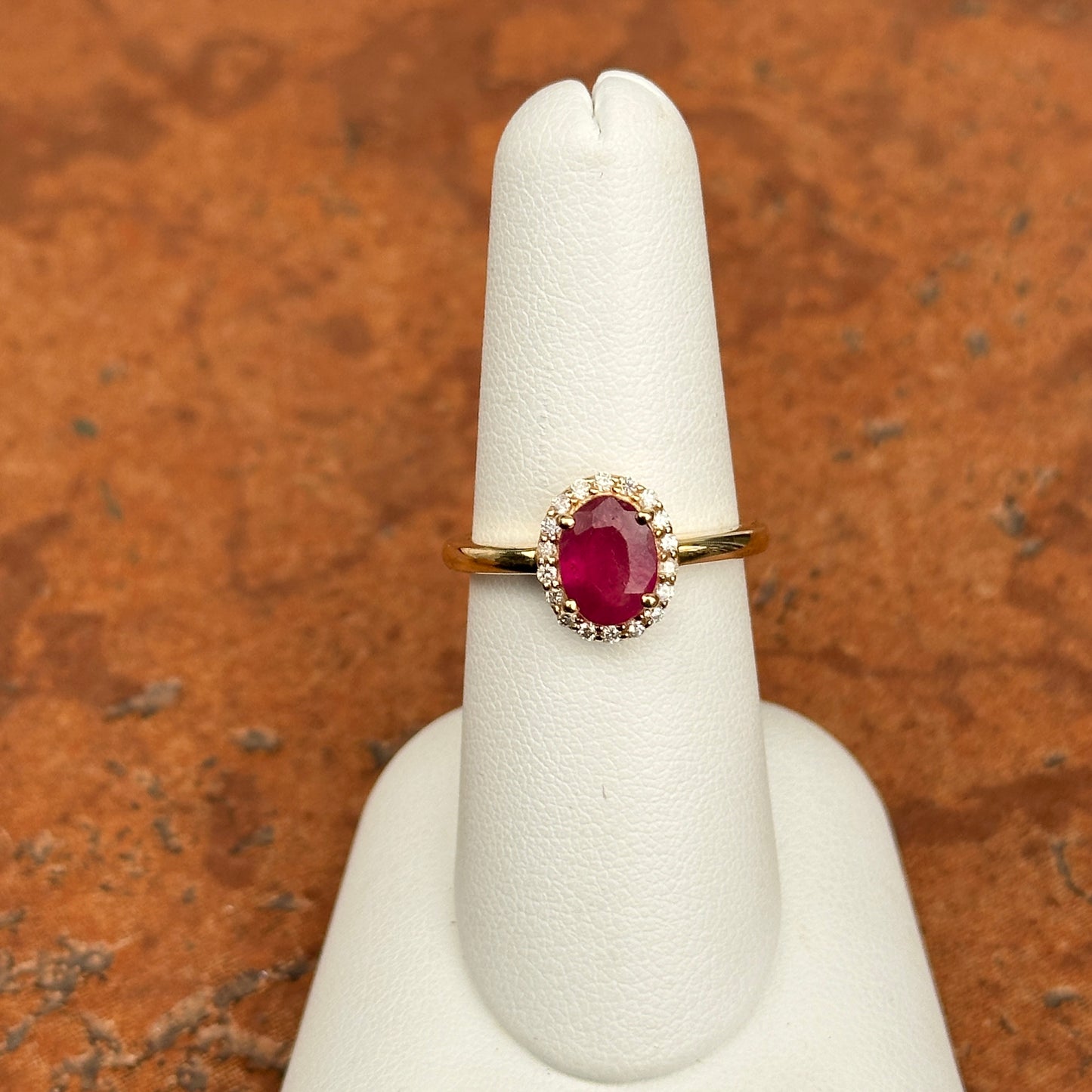 14KT Yellow Gold Oval 2 CT Ruby + Diamond Halo Ring