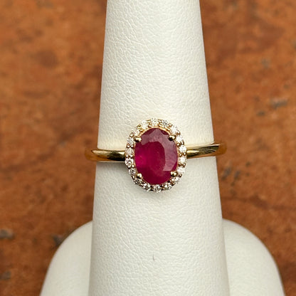 14KT Yellow Gold Oval 2 CT Ruby + Diamond Halo Ring