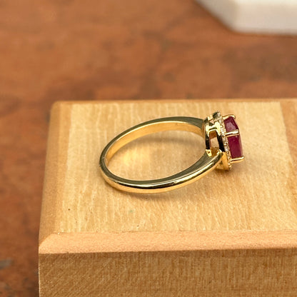 14KT Yellow Gold Oval 2 CT Ruby + Diamond Halo Ring