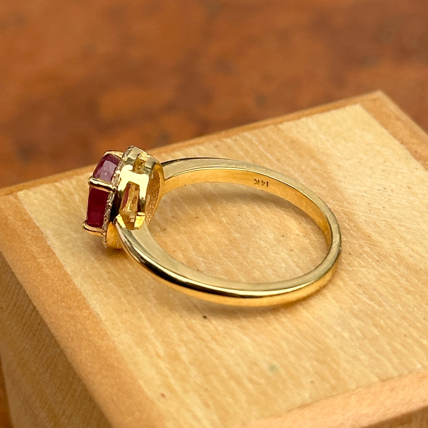 14KT Yellow Gold Oval 2 CT Ruby + Diamond Halo Ring