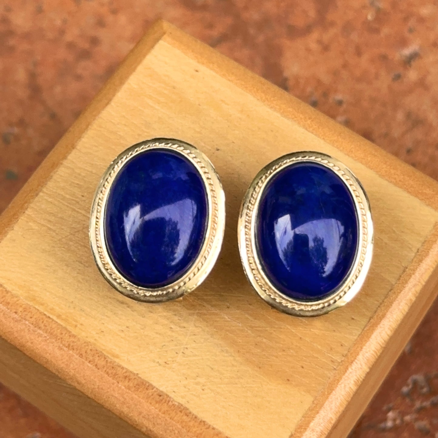 Estate 14KT Yellow Gold Oval Rope Bezeled Blue Lapis Omega Earrings