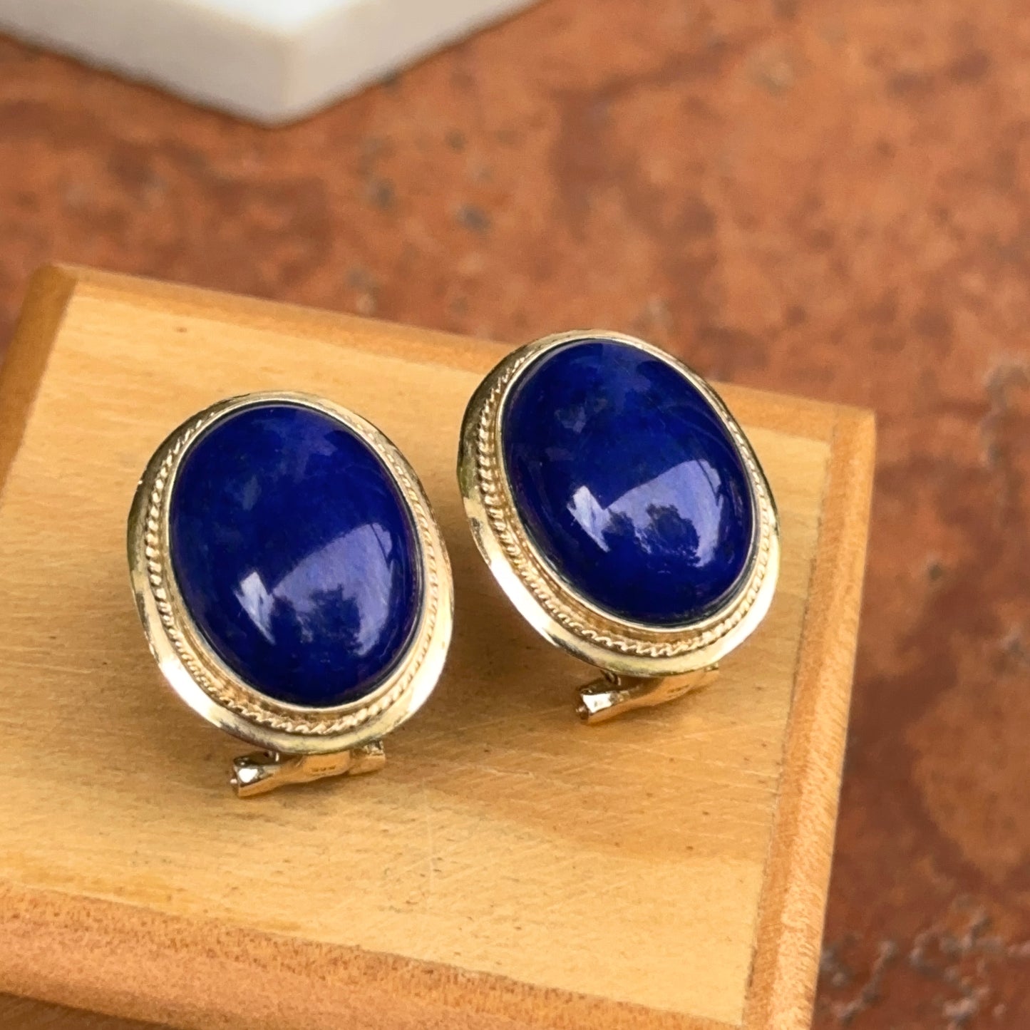 Estate 14KT Yellow Gold Oval Rope Bezeled Blue Lapis Omega Earrings