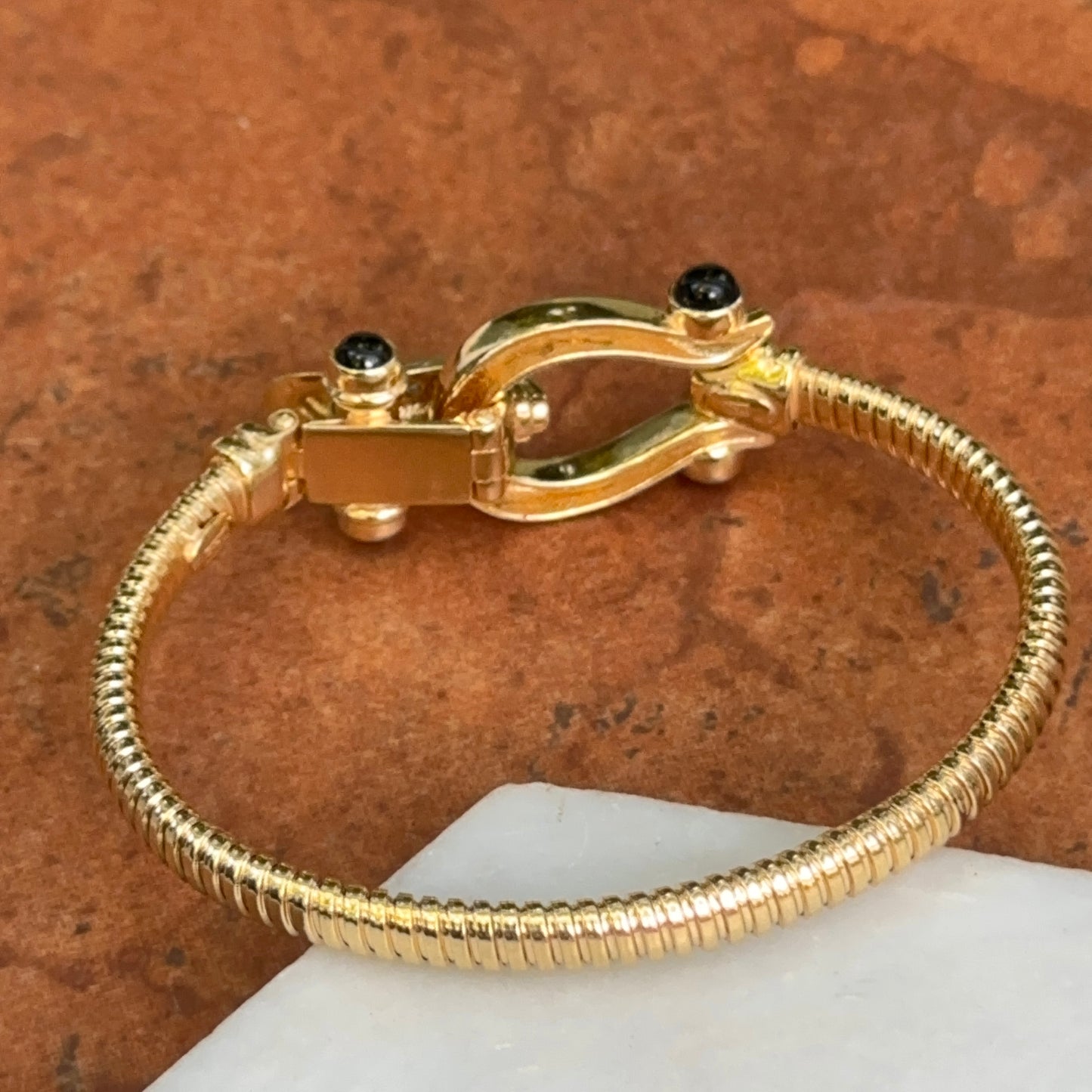 Yellow Gold-Plated Silver Ribbed Horse Bit/Shoe Round Diamond Black Cabochon Wide Bangle Bracelet
