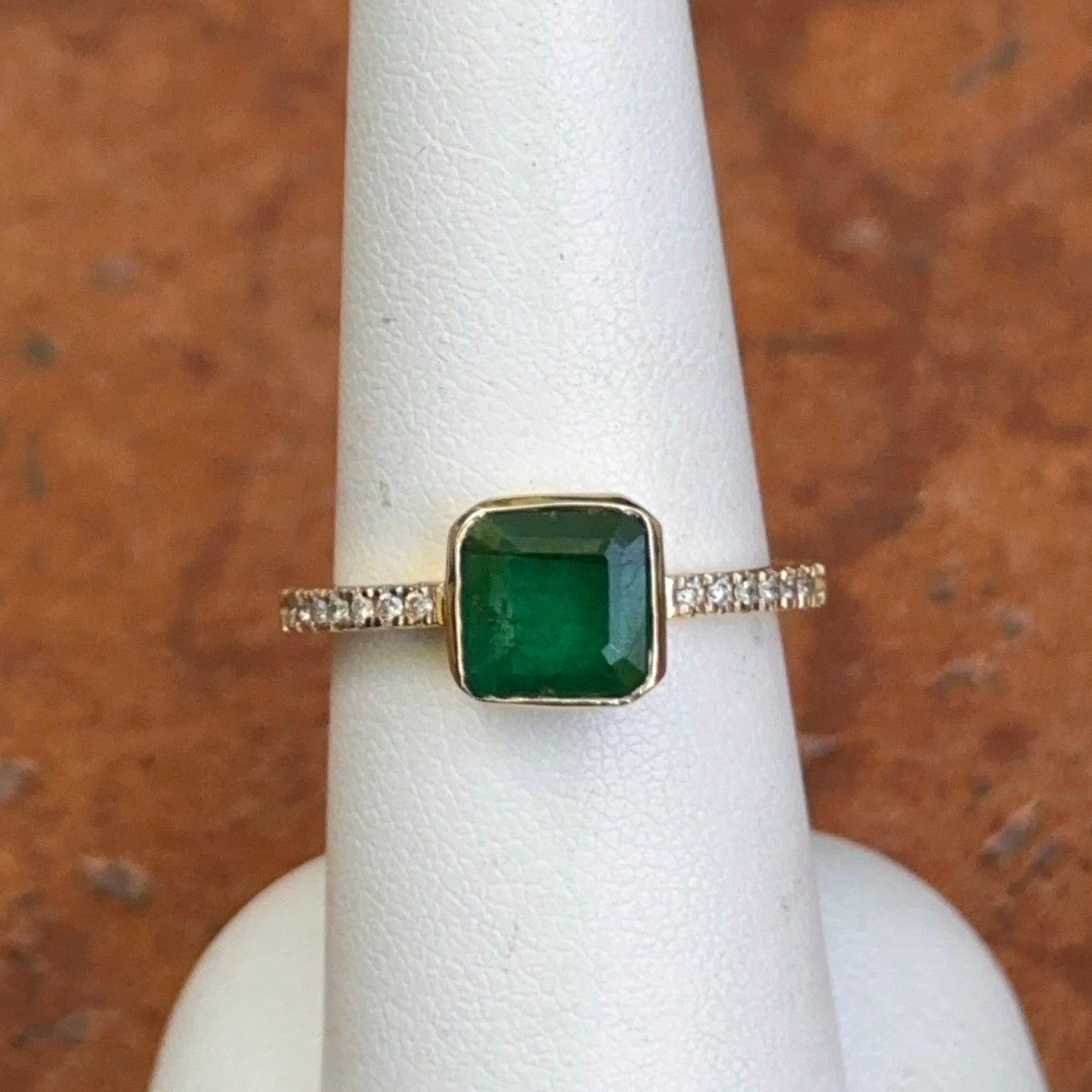 14KT Yellow Gold Bezel Emerald-Cut 1.10 CT Emerald + Diamond Ring