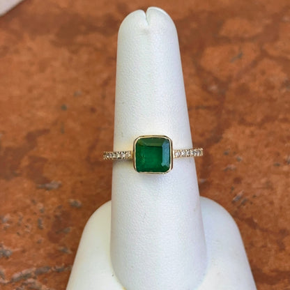 14KT Yellow Gold Bezel Emerald-Cut 1.10 CT Emerald + Diamond Ring
