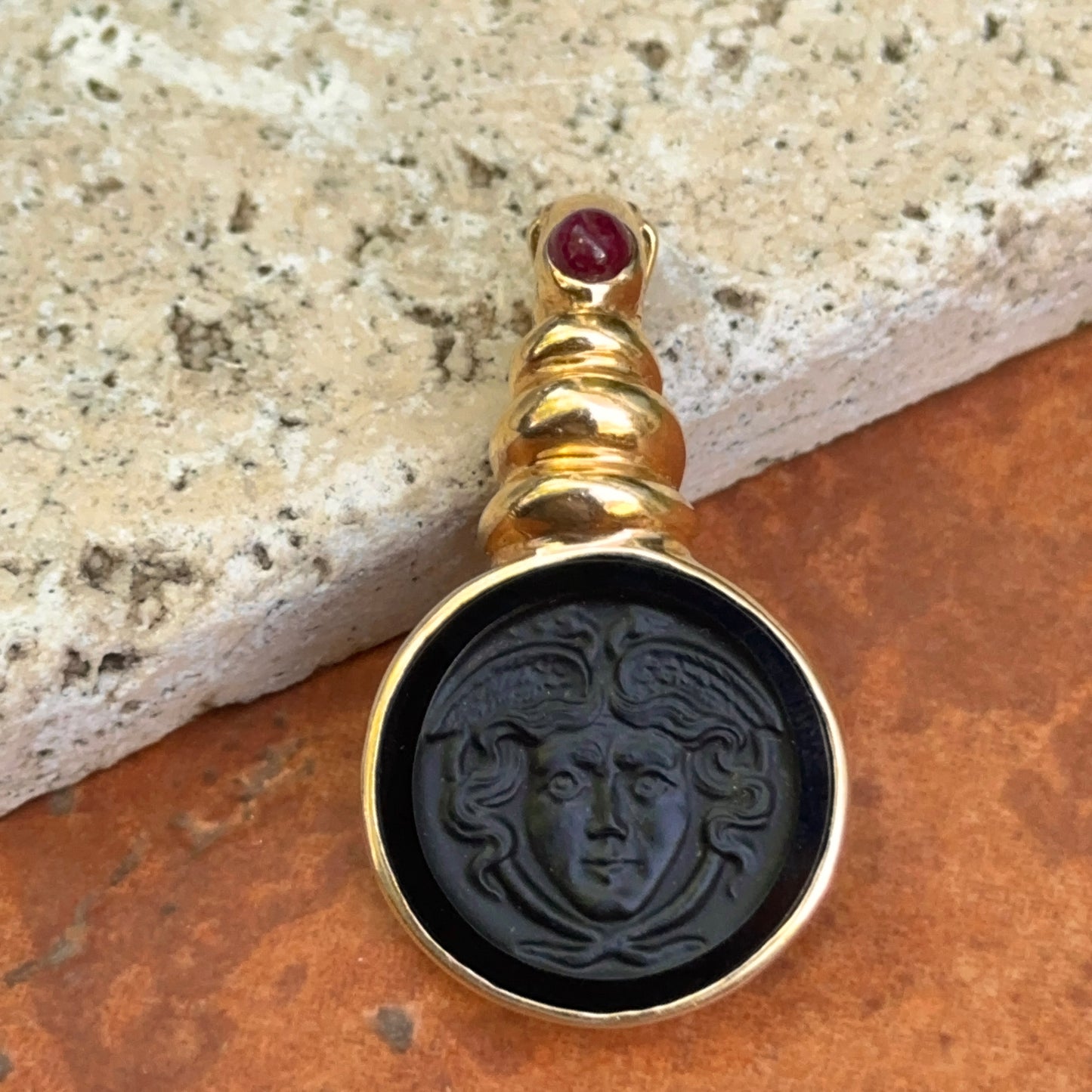 Estate 14KT Yellow Gold Carved Onyx Medusa Intaglio + Ruby Pendant