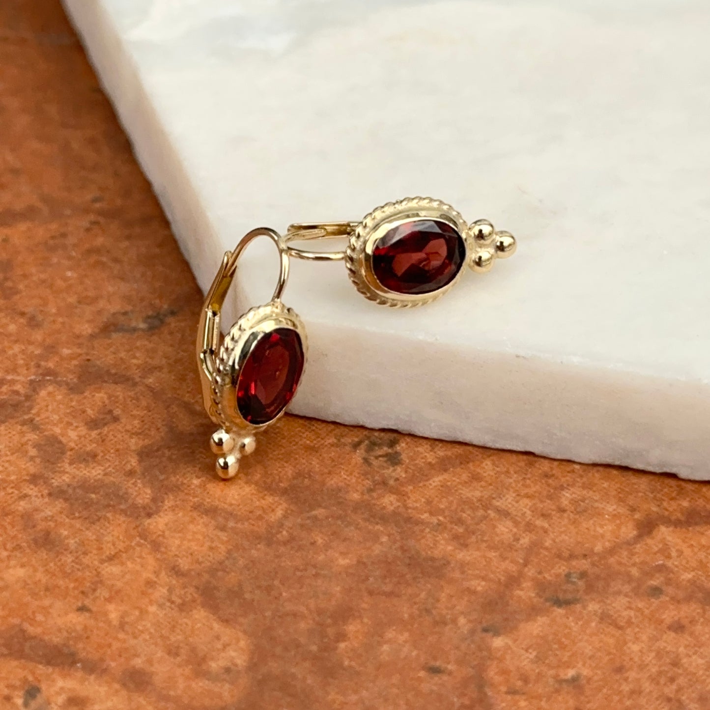 14KT Yellow Gold Oval Garnet Gemstone Detailed Frame Earrings