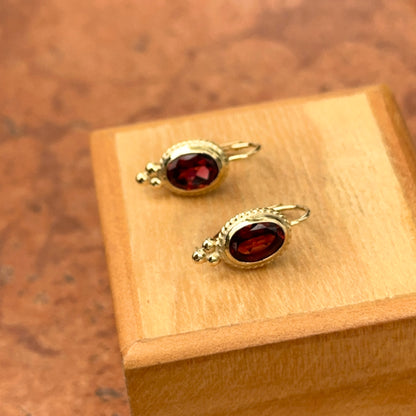 14KT Yellow Gold Oval Garnet Gemstone Detailed Frame Earrings