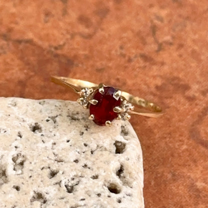 Estate 14KT Yellow Gold Oval .55 CT Garnet + Diamond Ring