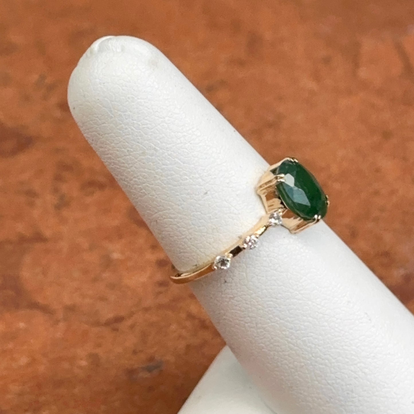 14KT Yellow Gold Oval 1.35 CT Emerald + Diamond Band Ring