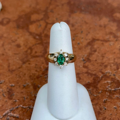 Estate 14KT Yellow Gold Oval Emerald + Diamond Halo Ring
