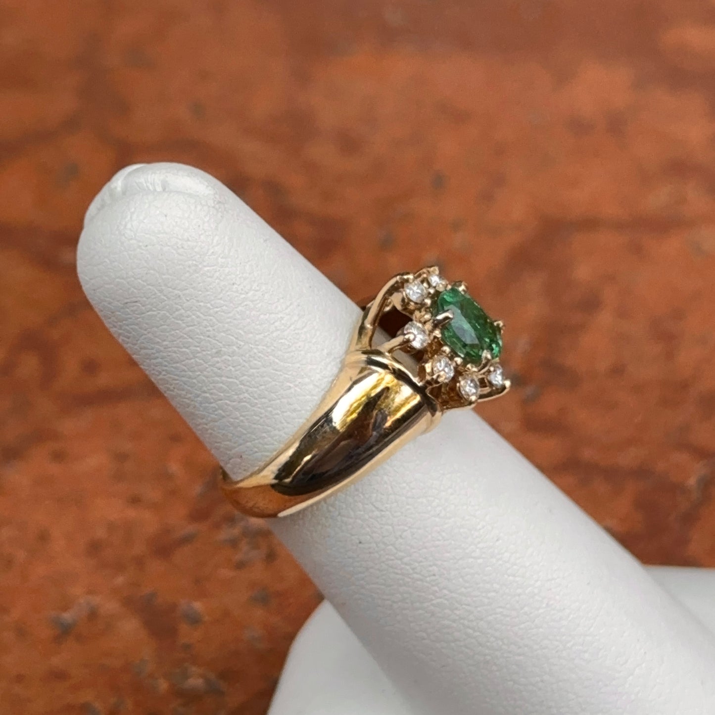 Estate 14KT Yellow Gold Oval Emerald + Diamond Halo Ring