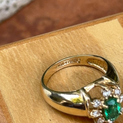 Estate 14KT Yellow Gold Oval Emerald + Diamond Halo Ring