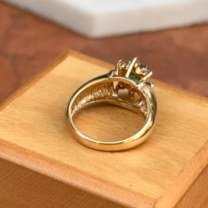 Estate 14KT Yellow Gold Oval Emerald + Diamond Halo Ring