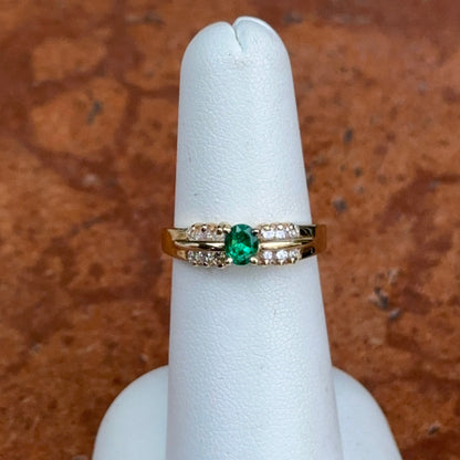 Estate 14KT Yellow Gold Oval Emerald + Round Diamond Ring