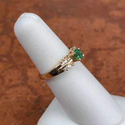 Estate 14KT Yellow Gold Oval Emerald + Round Diamond Ring
